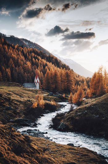 Valley of fire Autumn Nature VSCO Landscape South Tyrol Mountain Cloud - Sky Sky Beauty In Nature Nature Mountain Real People Scenics - Nature Tranquility Tree Plant One Person Tranquil Scene Lifestyles Non-urban Scene Water Land Day Leisure Activity Standing Outdoors