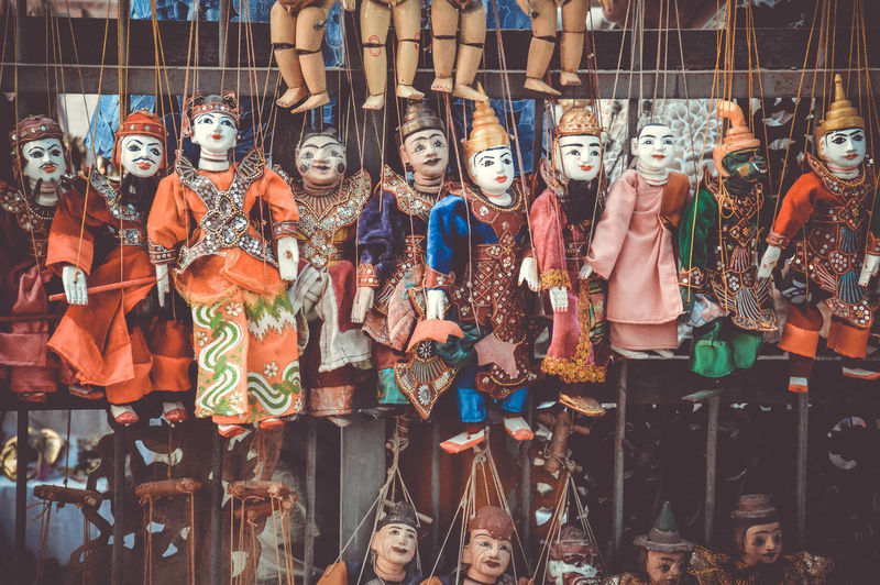 Full frame shot of puppets for sale at market stall