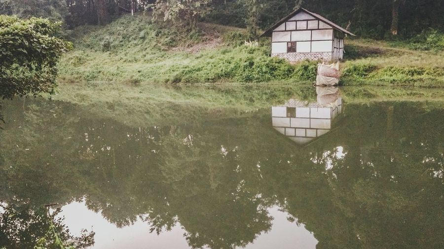 Reflection of house on water