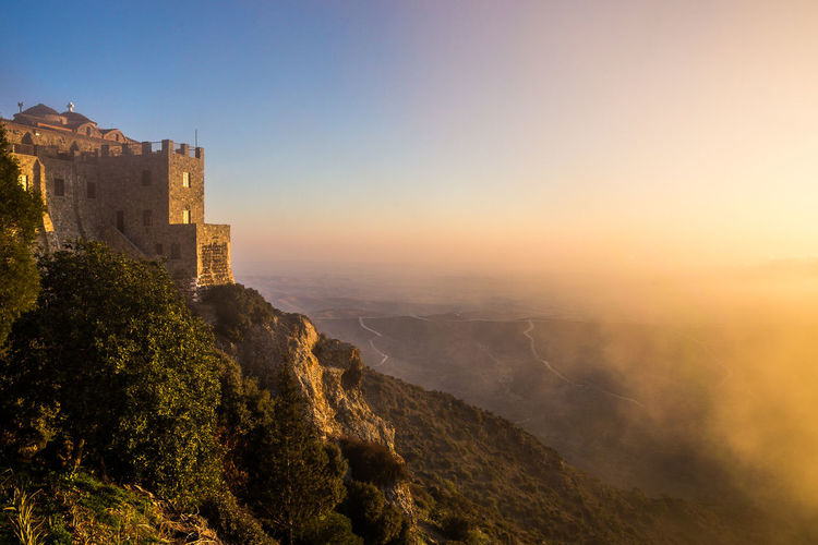 Scenic view of landscape at sunset