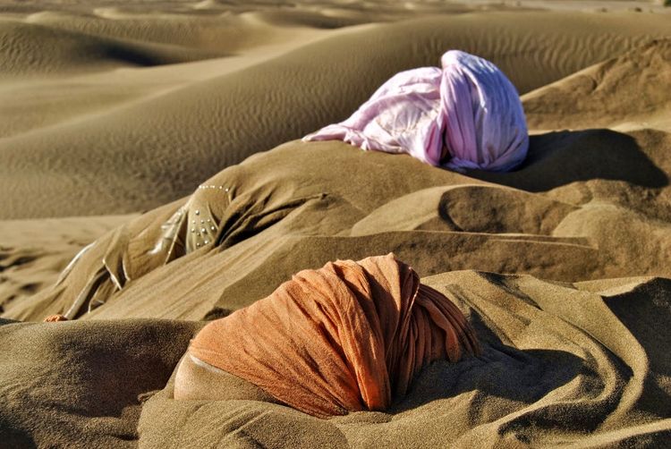 High angle view of bed on sand
