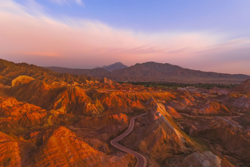 Scenic view of mountains against sky during sunset