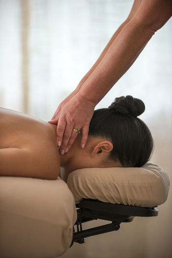 A woman getting a massage in the edgewood spa in stateline, nevada.