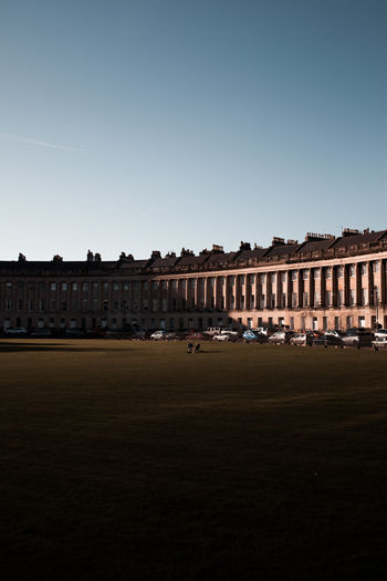 Royal crescent against clear sky in city
