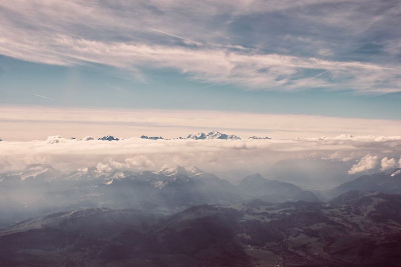 Aerial view of cloudscape over landscape