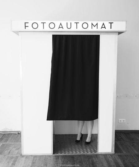 Low section of woman in photo booth