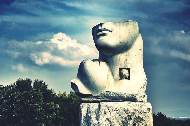 Low angle view of statue against sky