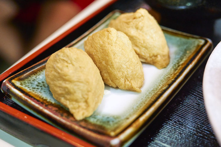 Close-up of fried dumplings on plate