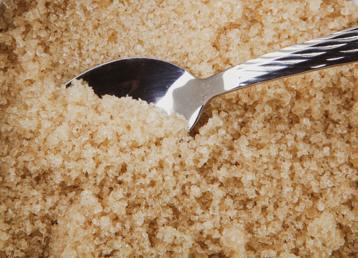 Close-up of brown sugar crystals background