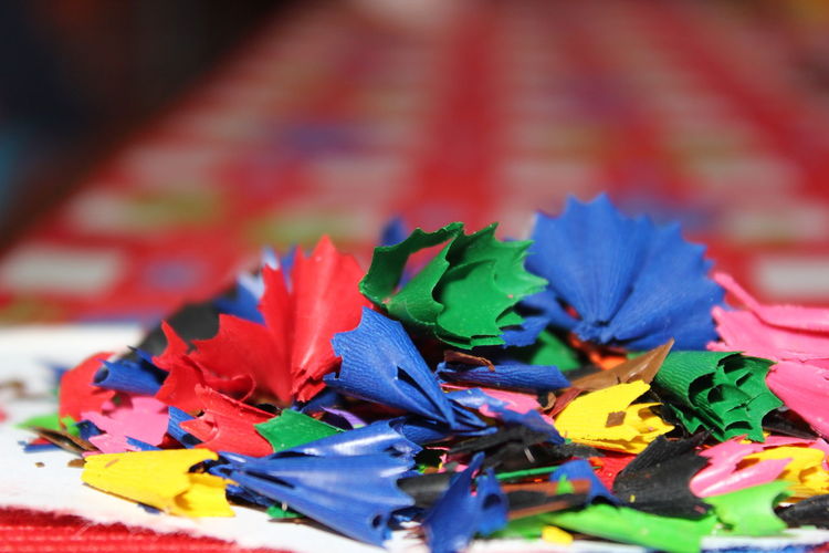 Close-up view of multi colored crayon shavings