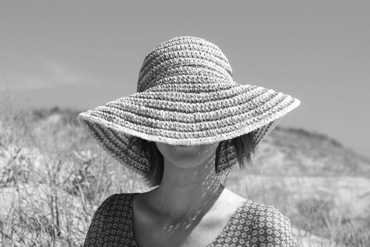Young woman wearing hat