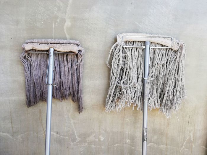 Close-up of mop against wall