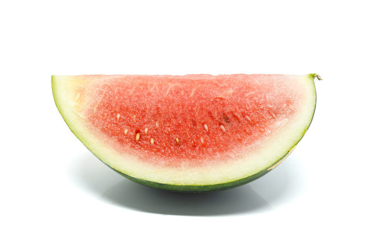 Close-up of apple against white background