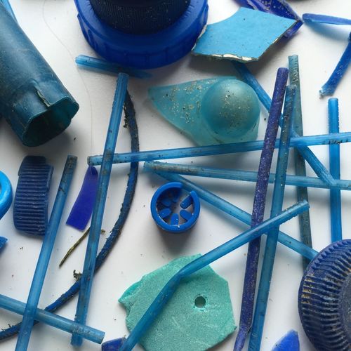 Close-up of blue broken objects on table