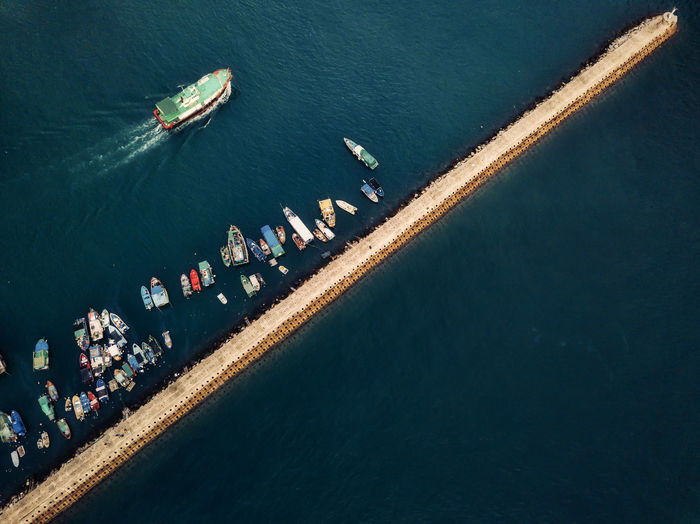 Small fishing boats near the wave barrier in aberdeen bay hong kong