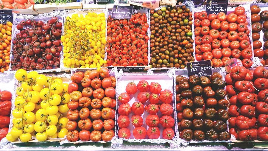 Tomatoes at market stall