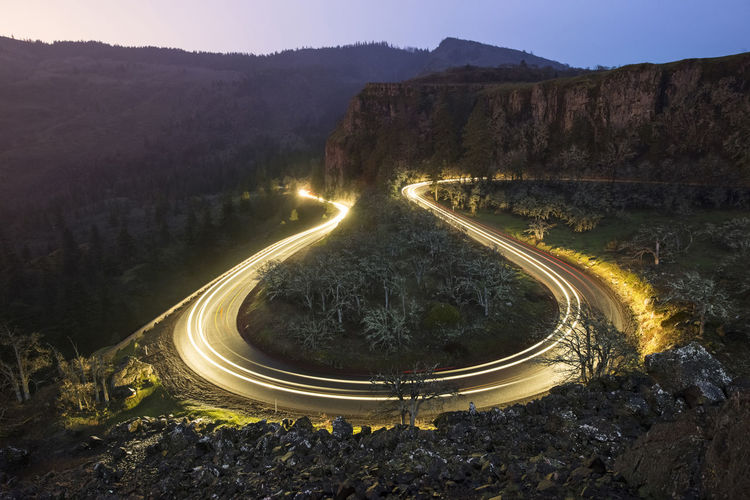 High angle view of light trails on road at columbia river gorge