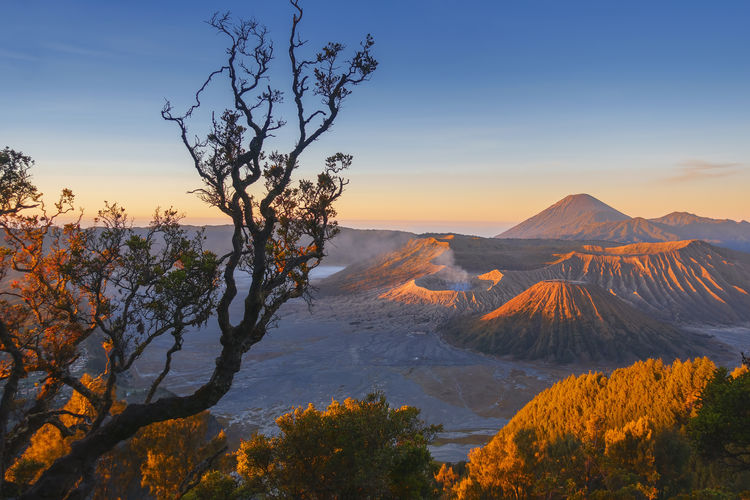 Scenic view of mountains against sky during sunset