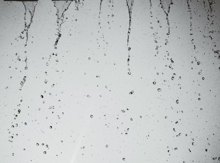 Full frame shot of water drops against sky