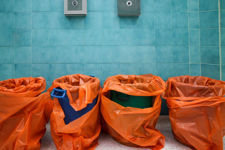 Garbage bins placed inside the hospital operating room.