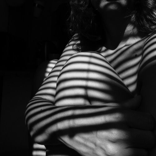 Striped shadow on woman