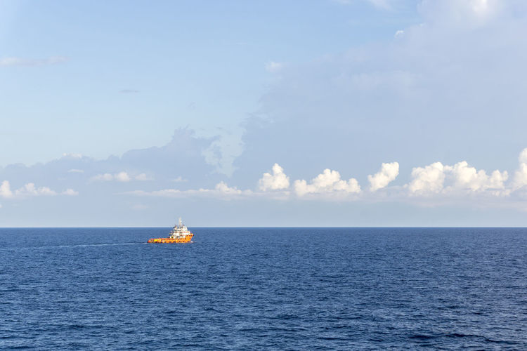 An anchor handling tugboat maneuvering at offshore terengganu oil field