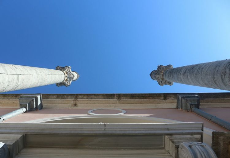 Sculpture of building against blue sky