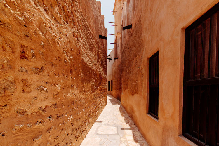 Narrow alley along buildings