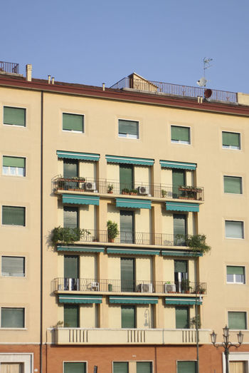 Low angle view of residential building against sky
