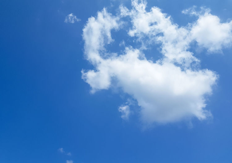 Low angle view of clouds in blue sky