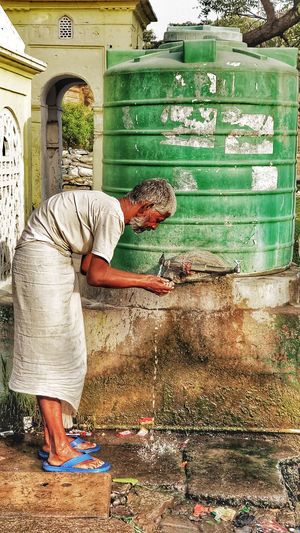 Man working at shore