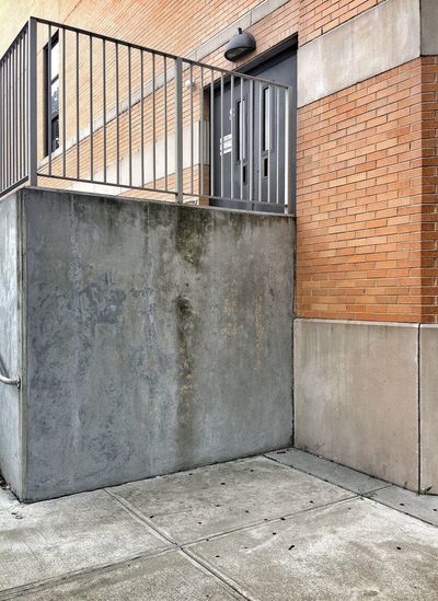 Brick wall in city