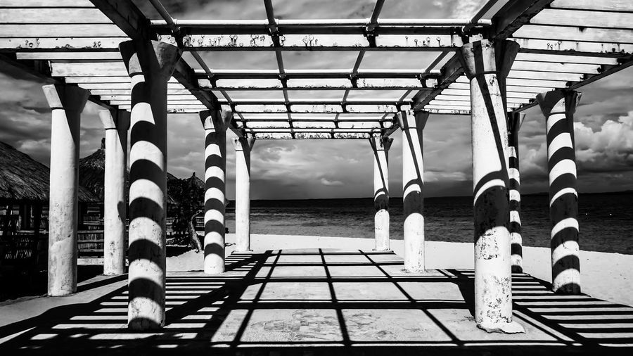 Built structure with pillars by sea