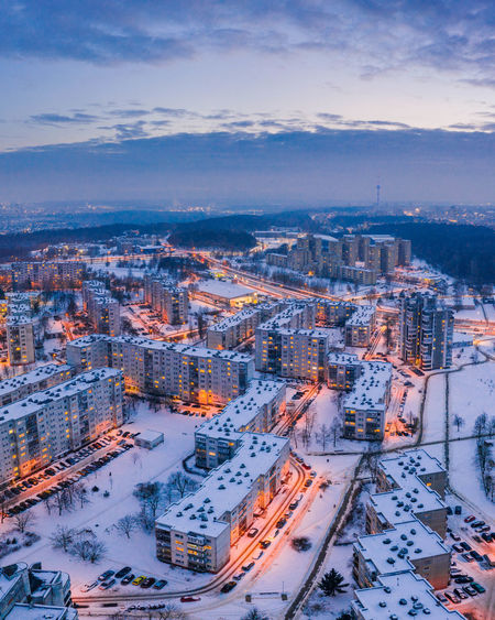Winter evening over soviet buildings
