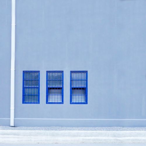 Windows on wall of building