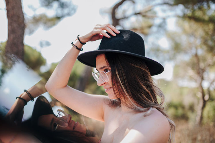 Portrait of woman wearing hat
