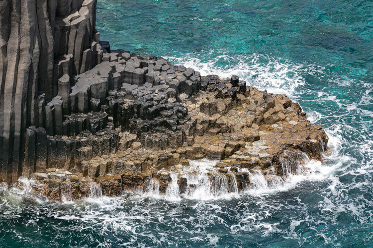 View of rocks in sea