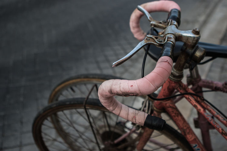 High angle view of bicycle parked on street horn steering vintage 