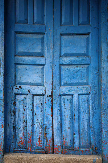 Full frame shot of old blue wooden door