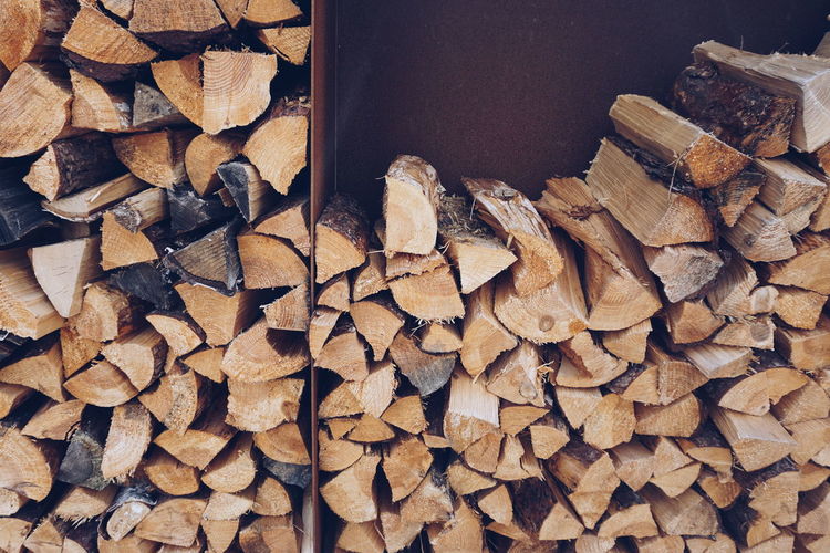 Stack of logs in shelf