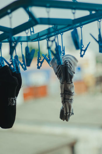 Close-up of clothes hanging on clothesline