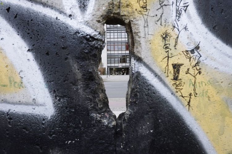 Graffiti on wall of old building