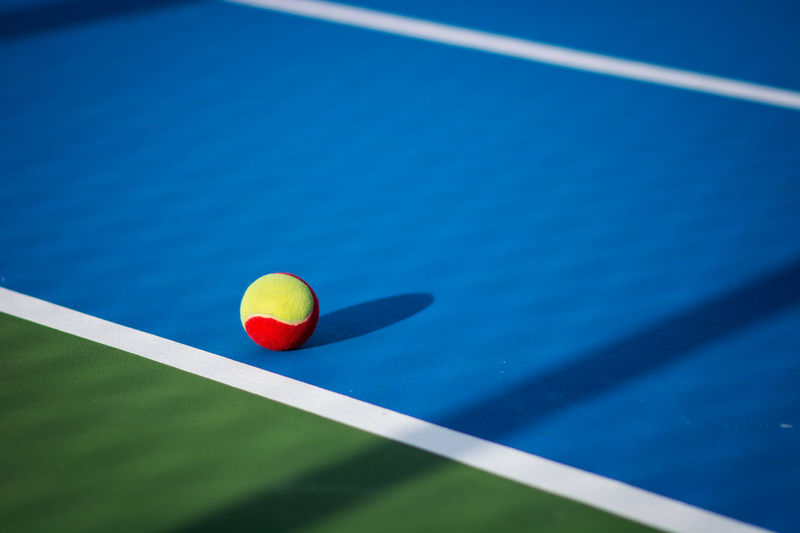 Close-up of ball on tennis court