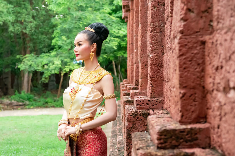 Full length of young woman in temple