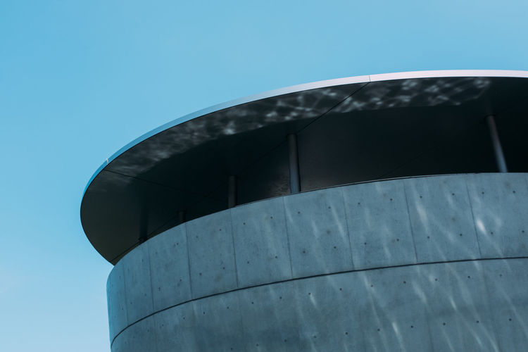 Low angle view of water tower against clear sky