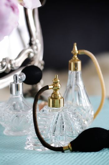 Close-up of perfume bottles on table