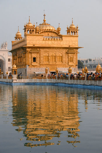 Reflection of building in lake - golden temple amritsar 