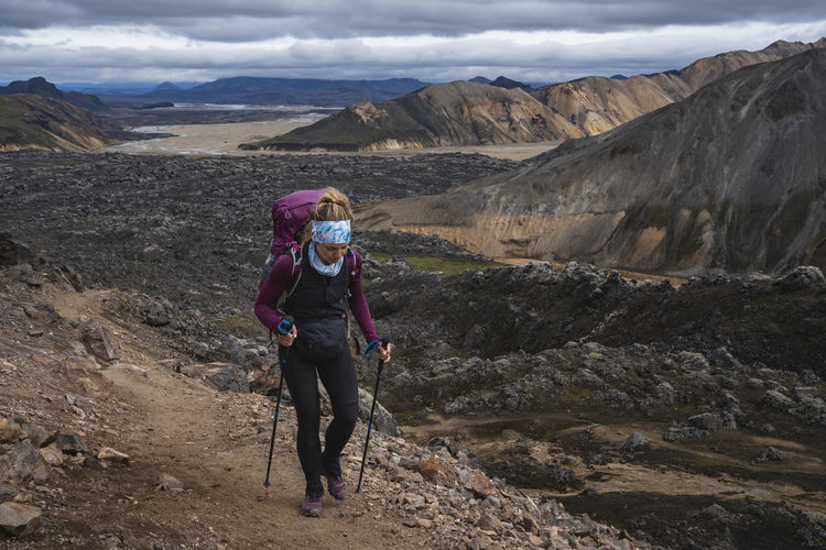 Female backpacking on laugavegur trail near landmannalaugar iceland