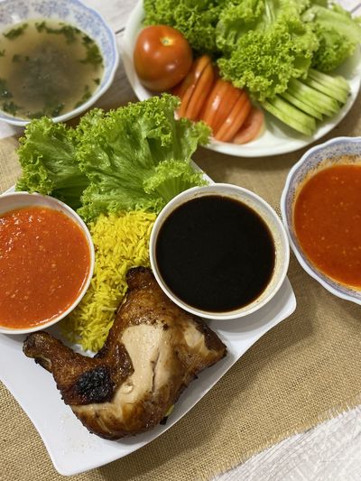 High angle view of chicken rice served on table