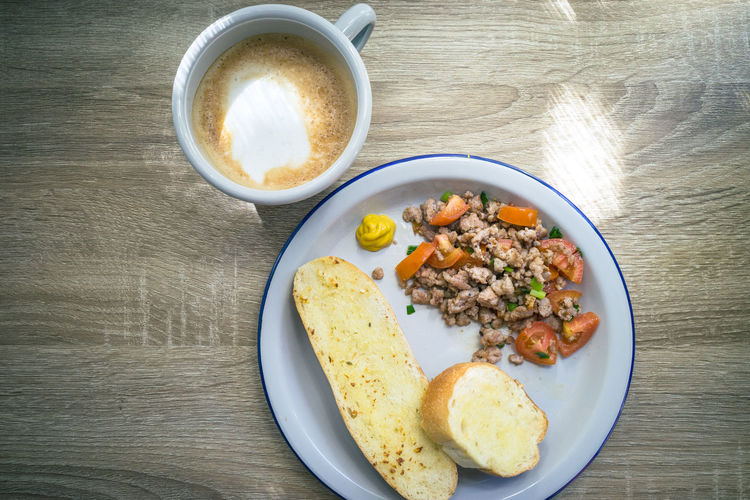 High angle view of breakfast served on table